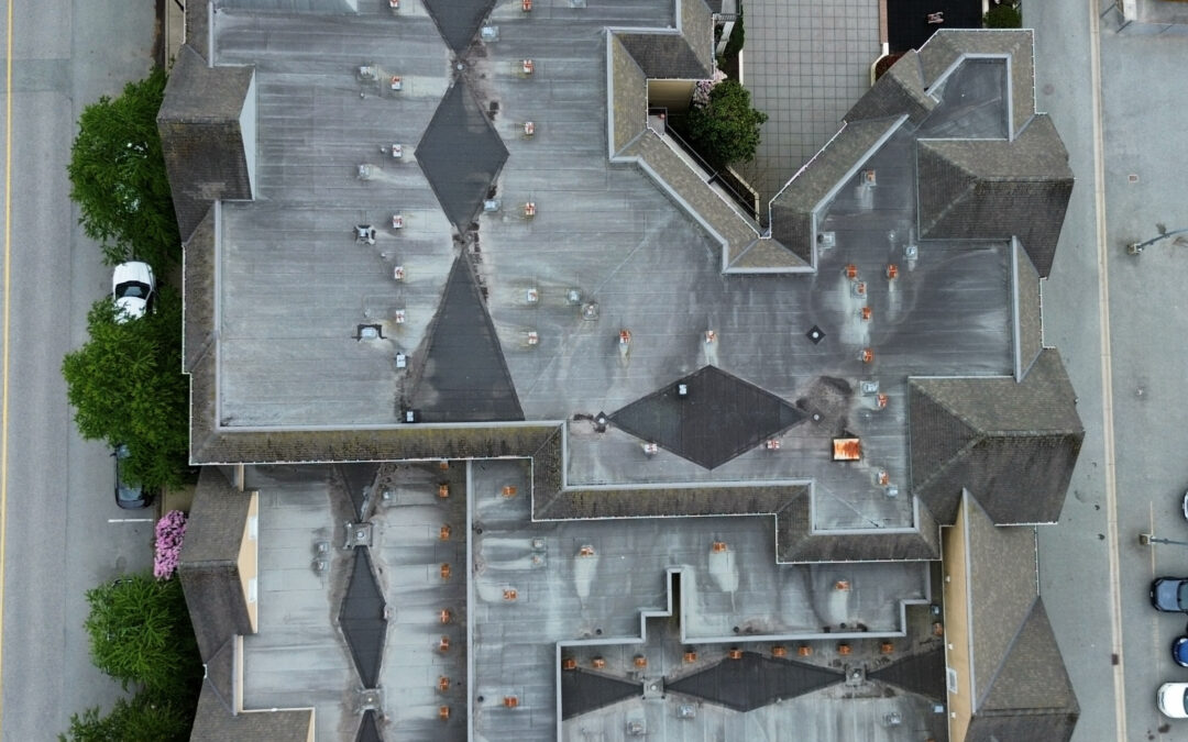 Roofers on Roof: Discover How Long Roofs Really Last [Sloped & Flat Roofs Explained]